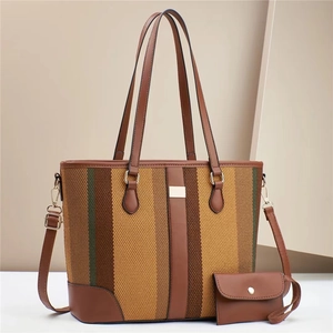 Striped contrast canvas tote bag set with brown leather straps and metal hardware detail