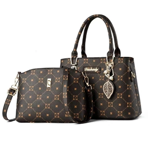 Classic monogram tote bag set with crossbody pouch in brown faux leather and gold charms