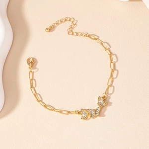 Elegant gold butterfly bracelet with pavé crystals on paperclip chain for women