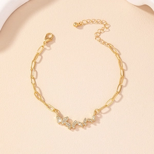 Elegant gold butterfly bracelet featuring sparkling rhinestones and a dainty link chain
