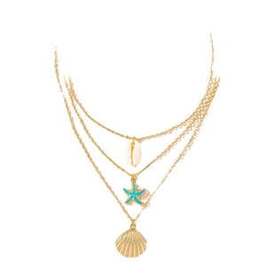 Three-layer gold starfish and shell pendant necklace for a summer bohemian beach look