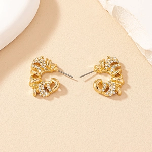 Elegant gold-plated geometric earrings with sparkling pavé crystals in a retro baroque style