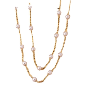 Elegant gold double-layered necklace featuring round white freshwater pearls for women