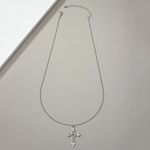 Punk style cross pendant necklace in silver finish with black enamel details for unisex wear