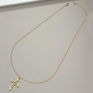 Gothic gold cross pendant necklace with black inlay and adjustable curb chain link