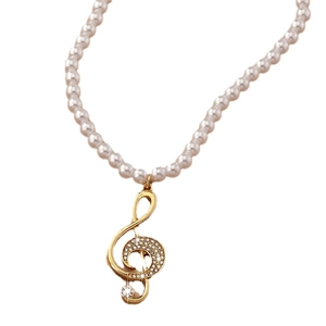 Elegant music note pendant necklace with freshwater pearls and sparkling crystals