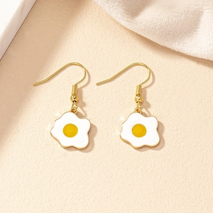 Cute fried egg drop earrings with yellow yolk and white enamel on golden hooks