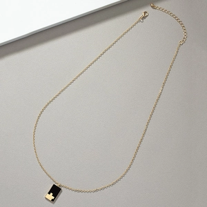 French vintage black checkered rectangle pendant necklace with gold chain and clasp