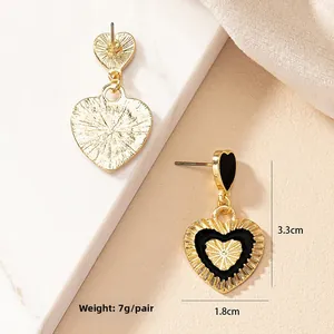 Detailed size view of black heart enamel earrings in gold finish showing dimensions and weight