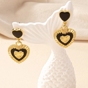 French retro heart drop earrings with black enamel and gold metallic texture display