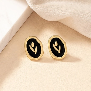 Boucles d'oreilles rétro françaises en or avec tulipe en émail noir de forme ovale