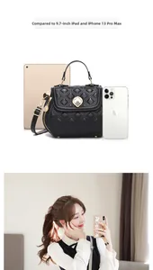 Black quilted shell bag showing interior capacity for a 9.7-inch iPad and large smartphone