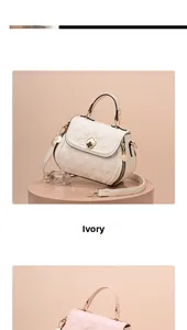 Close-up of quilted shell-shaped shoulder bag with clover clasp and top handle