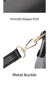 Detail of smooth gold hardware clasp and stitching on black leather shell shoulder bag