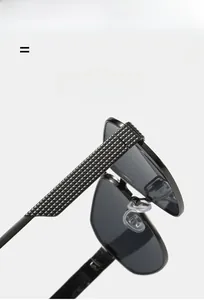 Detail of metallic double-bridge sunglasses featuring textured super elastic temples