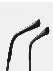 Macro view of ergonomic curved glossy temples on black metal double bridge sunglasses