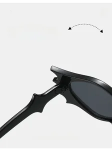 Macro shot of durable metal hinges on bat-shaped hip-hop sunglasses with sleek black finish