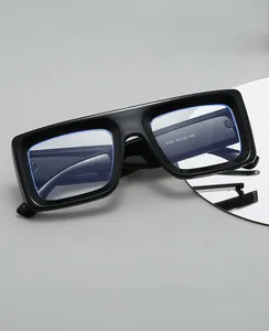 Detail view of bold square frame glasses showing temple size specifications 5704 56-25-148