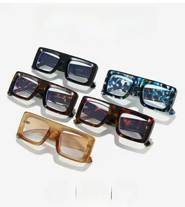 Close-up of model 5704 wide square eyeglass frames in various colors and patterns