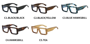 Close-up of stylish thick-frame square eyeglasses in five vintage color variants
