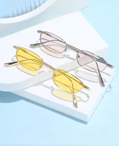 Close-up of oval metal frame glasses in yellow and purple lenses on a blue stand