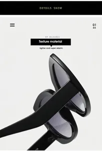 Detalle de la patilla ancha y la montura cat-eye de estas gafas de sol negras grandes