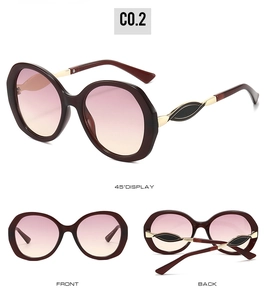Three-angle display of oversized burgundy glasses with gold leaf metal temples and gradient lenses