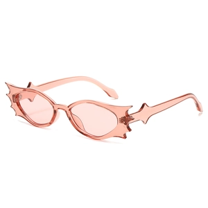 Hip hop bat shaped oversized sunglasses in transparent pink with unique wing frame
