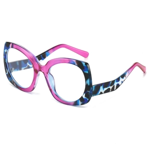Retro cat-eye sunglasses with trendy pink and blue leopard print frame in bold large style