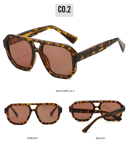 Detail view of double bridge tortoiseshell aviator sunglasses with brown polarized lenses