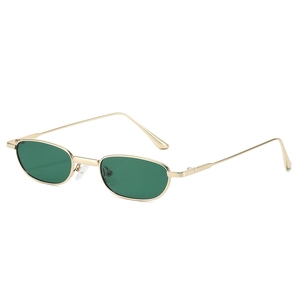 Retro small oval sunglasses with golden metal frames and dark green polarized lenses