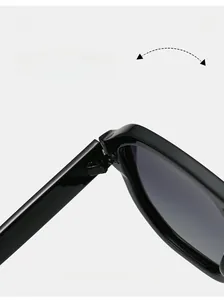 Close-up of durable metal hinge on black double-bridge aviator sunglasses frame