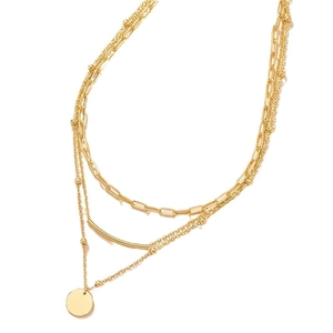 Three-layer gold necklace featuring paperclip chain, bead accents, and a polished round coin