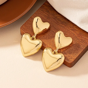 Bohemian style double gold heart drop earrings with high polish finish for women
