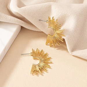 Modern gold sunburst stud earrings with a minimalist radiant sun pattern for women