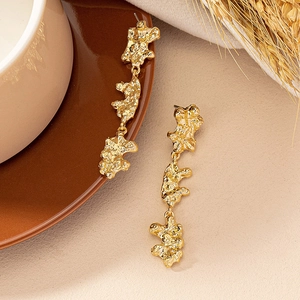 Elegant gold irregular lava texture long earrings with three-tiered link design