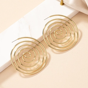 Exaggerated golden spiral hoop earrings with unique geometric multi-layer swirl design