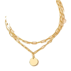 Double-layered gold pendant necklace with a minimalist round tag and paperclip chain