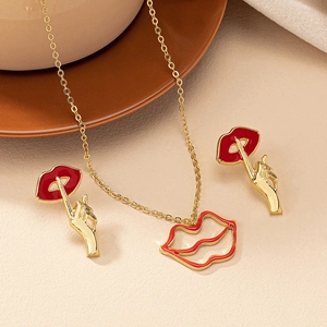 Parure bijoux vintage française avec lèvres et geste du doigt, collier et boucles