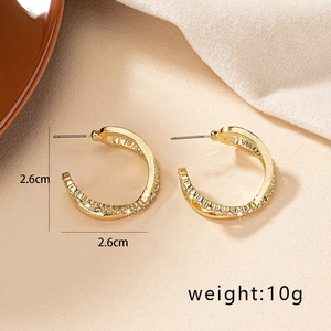 Golden double circle twisted C-shaped earrings with rhinestones measuring 2.6cm diameter