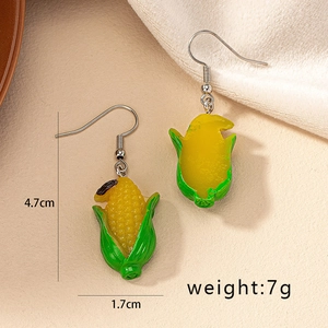 Boucles d'oreilles créatives en résine maïs jaune et vert, dimensions 4.7cm x 1.7cm