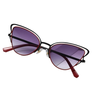 Lunettes de soleil œil de chat en métal avec verres dégradés violets et monture évidée