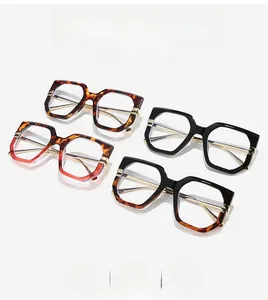 Detailed grid of four stylish blue light blocking geometric glasses in various tortoise patterns