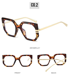 Three angles of tortoise shell glasses with gold metal temples in a modern geometric style