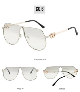 Three perspectives of oversized aviator sunglasses with unique double heart metal hinges