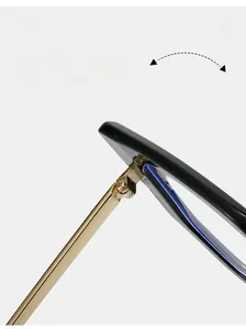 Close-up of durable metal hinge on black and gold anti-blue light glasses frames