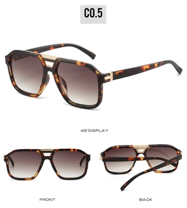 Macro detail of tortoiseshell aviator sunglasses with double bridge and gold hinges