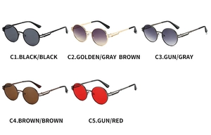 Detail view of five retro round metal sunglasses with hollow temples and tinted lenses