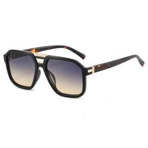 Retro double-bridge aviator sunglasses with black frame and blue-yellow gradient lenses