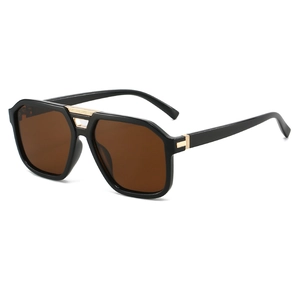 Retro pilot sunglasses with black frame and gold metal accents shown in a 45-degree angle view